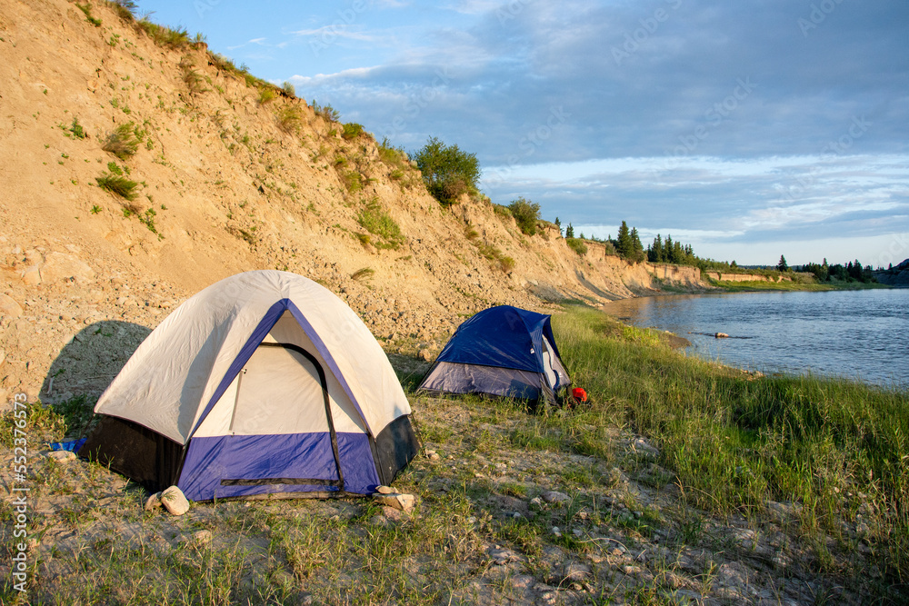 Tents on bank of Red Deer River
