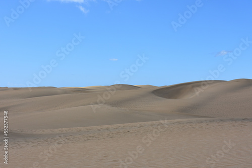 Fototapeta Naklejka Na Ścianę i Meble -  Scenic view of the sand dunes at Maspalomas