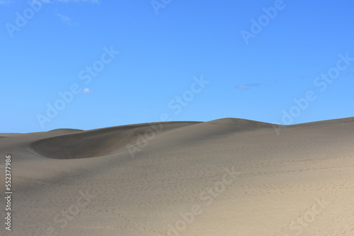 Fototapeta Naklejka Na Ścianę i Meble -  Scenic view of the sand dunes at Maspalomas