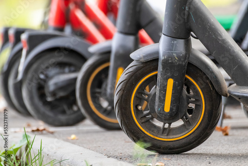 Electric Scooters rental parking in city street