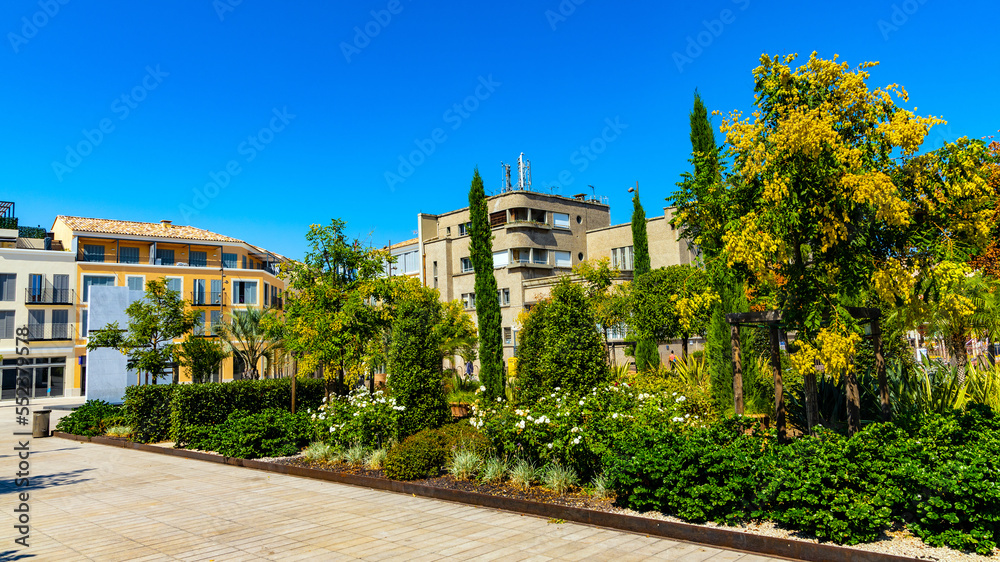 Fototapeta premium Resistance Victims square and park, Place des Martyrs de la Resistance, in historic old town of Antibes resort city onshore Azure Cost of Mediterranean Sea in France