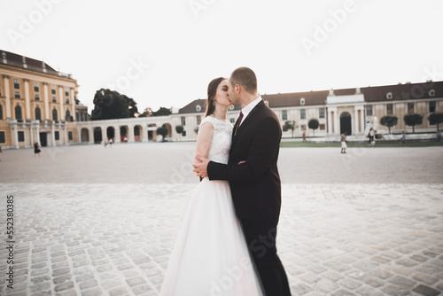 Lovely happy wedding couple, bride with long white dress