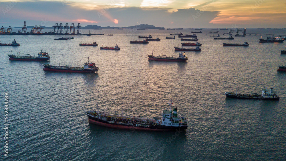 Aerial view Oil and Gas tanker ship industrial crude oil fuel and petrochemical tanker, Global business import export oil and gas petrochemical with tanker ship.