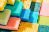 cleaning sponge background. sponges for cleaning different colors and different sizes