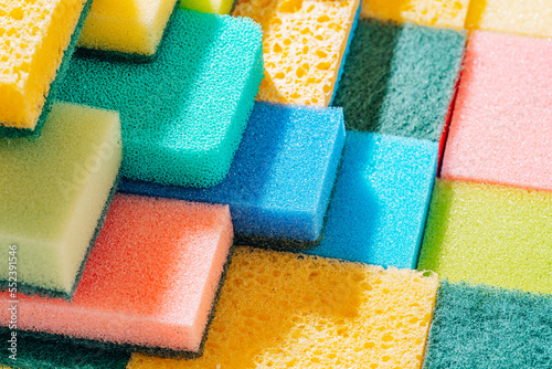 cleaning sponge background. sponges for cleaning different colors and different sizes photo