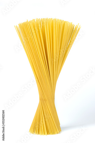 Dry spaghetti isolated on white background. Traditional food