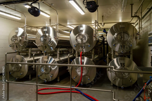 Modern interior of a brewery containing stainless steel