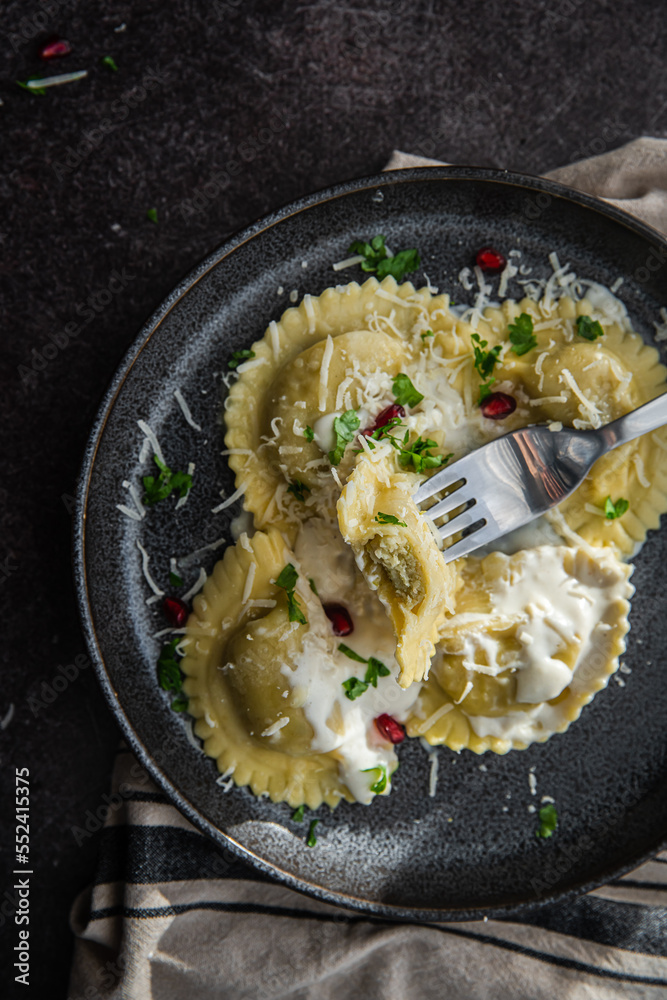 Mezzelune filled with parmesan and asparagus with creamy sauce. Mezzelune filled with parmesan and asparagus with creamy sauce.