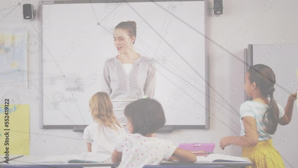 Animation of digital screen over class of diverse teacher and pupils at school Animation of digital screen over class of diverse teacher and pupils at school