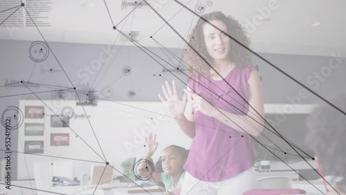 Animation of network of connections and data processing over female teacher with school children photo