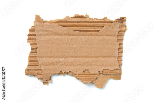 Cardboard corrugated piece with ripped edge on white background