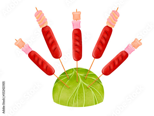 Filipino hotdog marshmallow sticks with warm colors stuck on cabbage