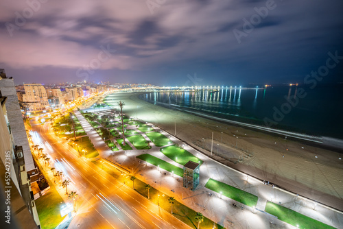 Panoramic view over the buildings downtown Tanger at night in Morocco