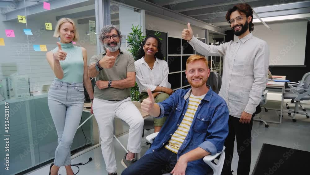 Portrait of confident multiracial professional business people team, young and mature colleagues employees looking at camera with serious face. Group of office workers of a startup company