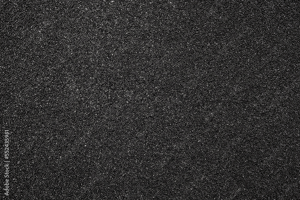 The texture of dense black foam rubber.The background of the foam is black.The substrate is made of black foam rubber. The texture of dense black foam rubber.The background of the foam is black.The substrate is made of black foam rubber.