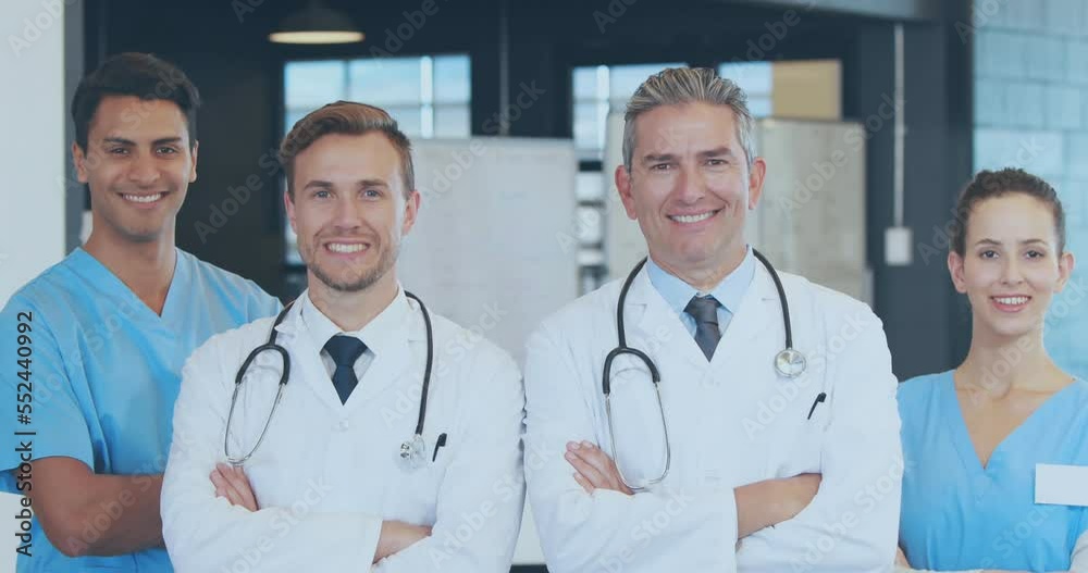Animation of national cancer day text over diverse doctors Animation of national cancer day text over diverse doctors