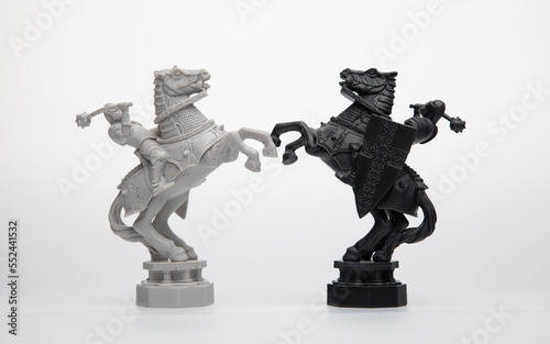Two chess pieces on a white background