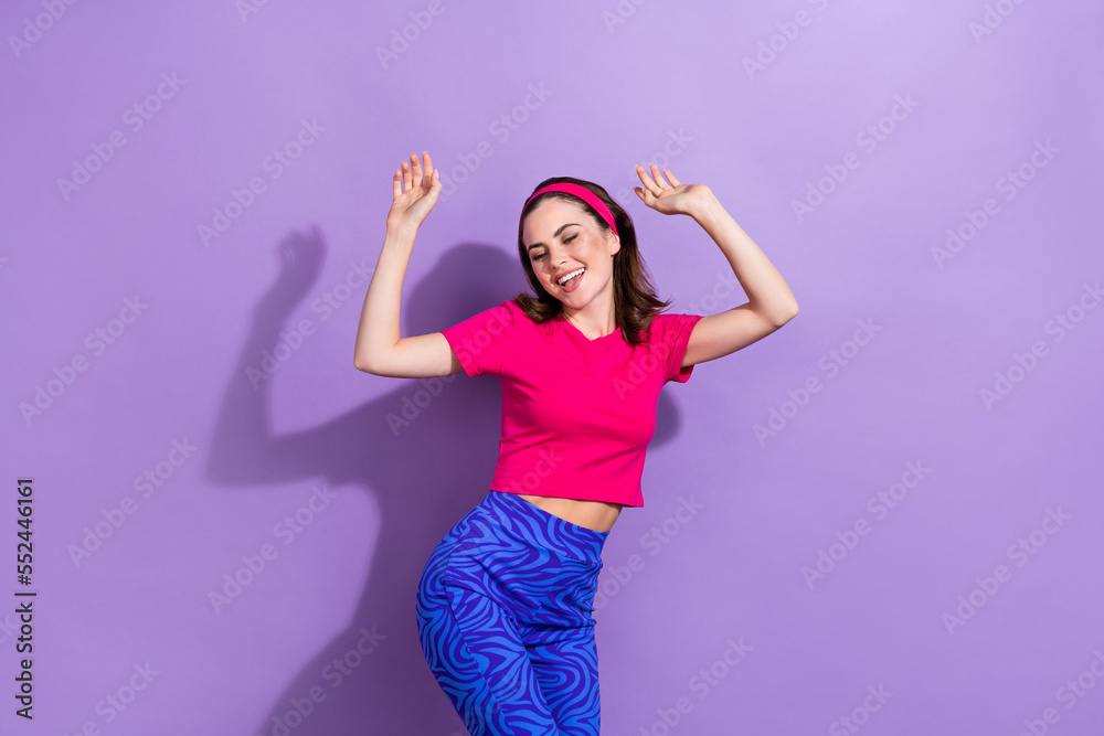 Portrait of excited cheerful person chilling clubbing good mood isolated on purple color background Portrait of excited cheerful person chilling clubbing good mood isolated on purple color background