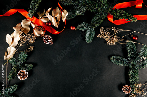 Christmas holiday background with decorations and fir tree. Top view with clear space for text
