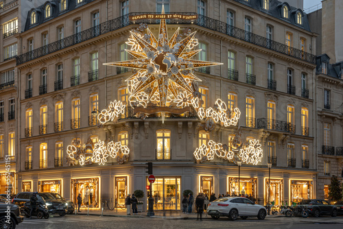 Paris, France - 12 08 2022: View of facade of Christian Dior Paris with christmas decoration photo