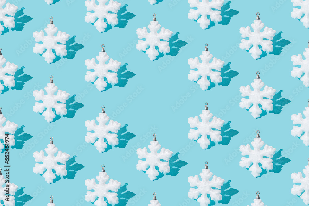 Snowflake on ablue background. Pattern. Minimal design. Copy space. Snowflake on ablue background. Pattern. Minimal design. Copy space.