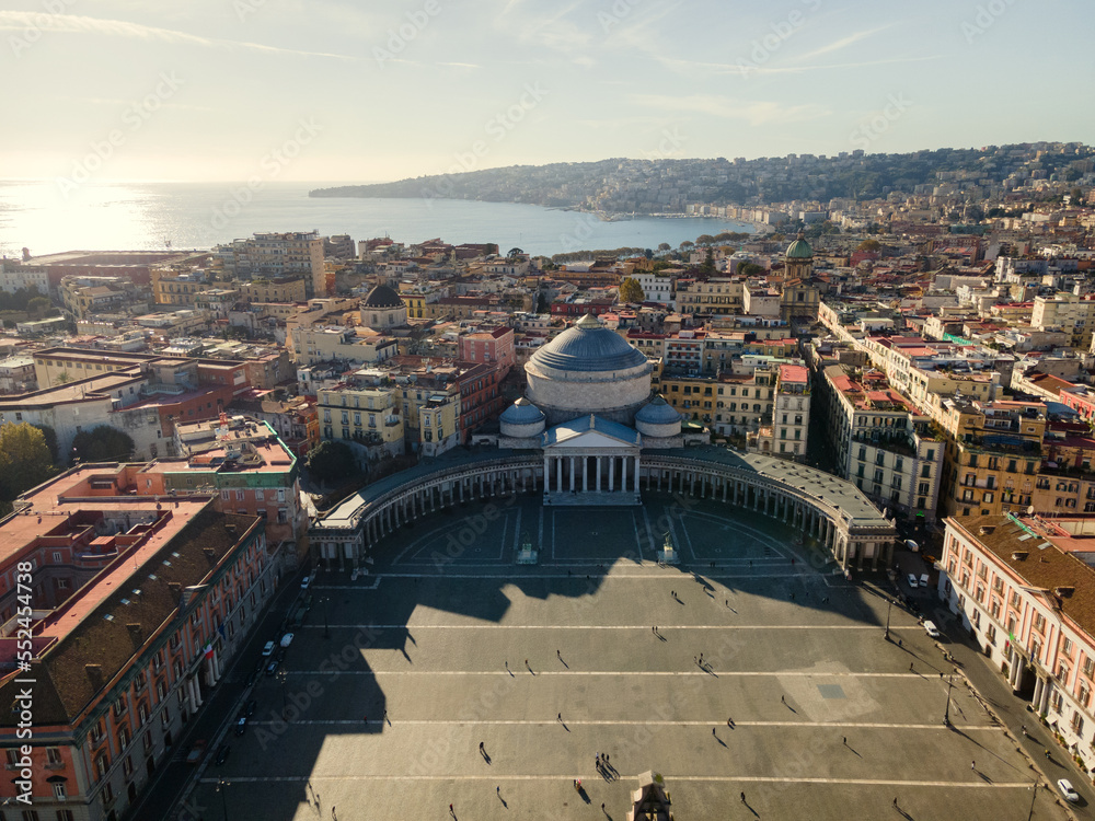 Panoramic drone view of the entire city of Naples in southern Italy. Flight over historical landmarks in Naples, Italy. Plebischito central square and royal palace
