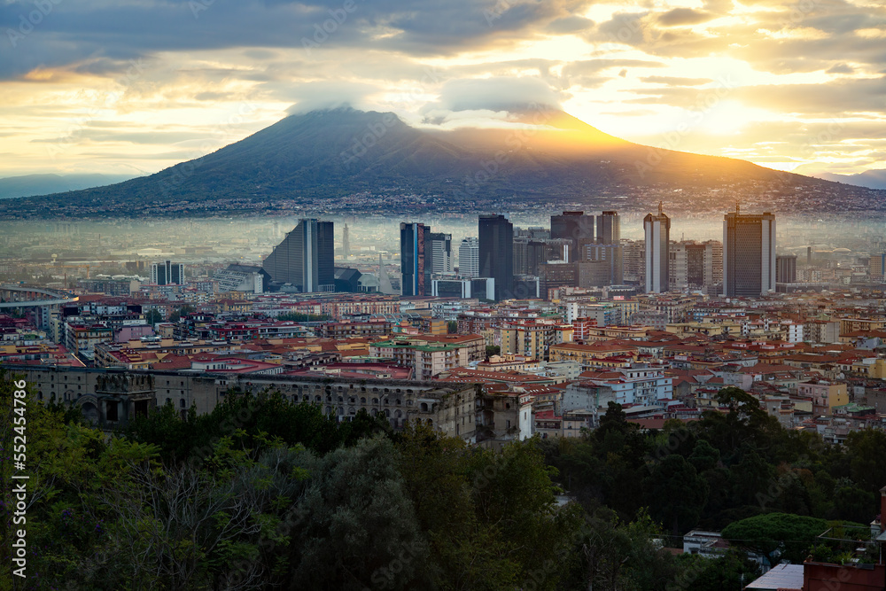 Sunrise in Naples Italy. View of the Gulf of Naples from the Posillipo hill with Mount Vesuvius far in the background. Sunrise in Italian city