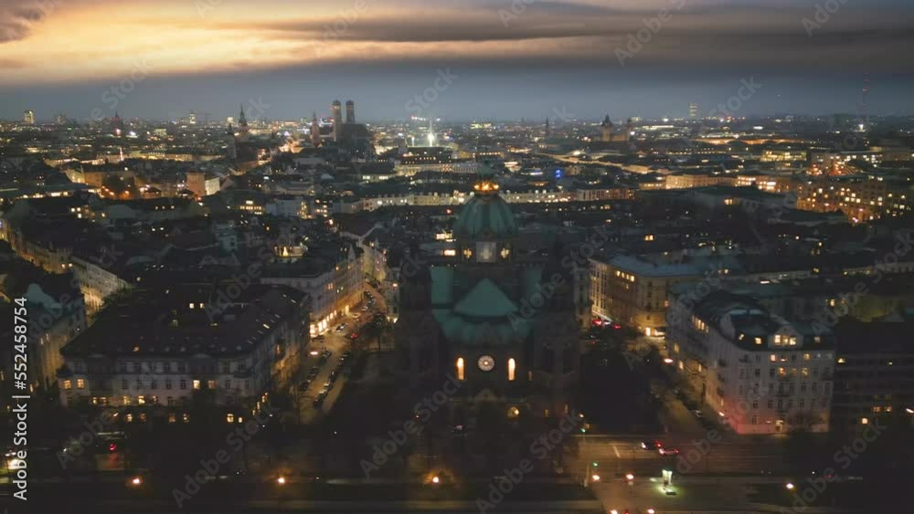 Drone video of Munich night aerial skyline view from above view of city centre church and marienplatz square from above, fly over church isar river germany. Munich night view. Drone video of Munich night aerial skyline view from above view of city centre church and marienplatz square from above, fly over church isar river germany. Munich night view.