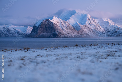 Snow covered Himmeltindan mountain, Lofoten Islands, Norway photo