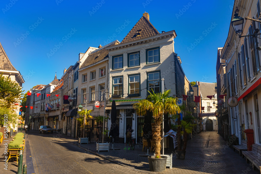 Streets of Breda, view of residential buildings, diners and shops. Province of North Brabant, Netherlands.