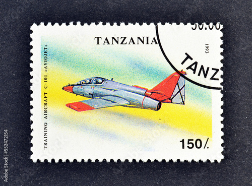 Cancelled postage stamp printed by Tanzania, that shows C-101 Aviojet, circa 1993. photo
