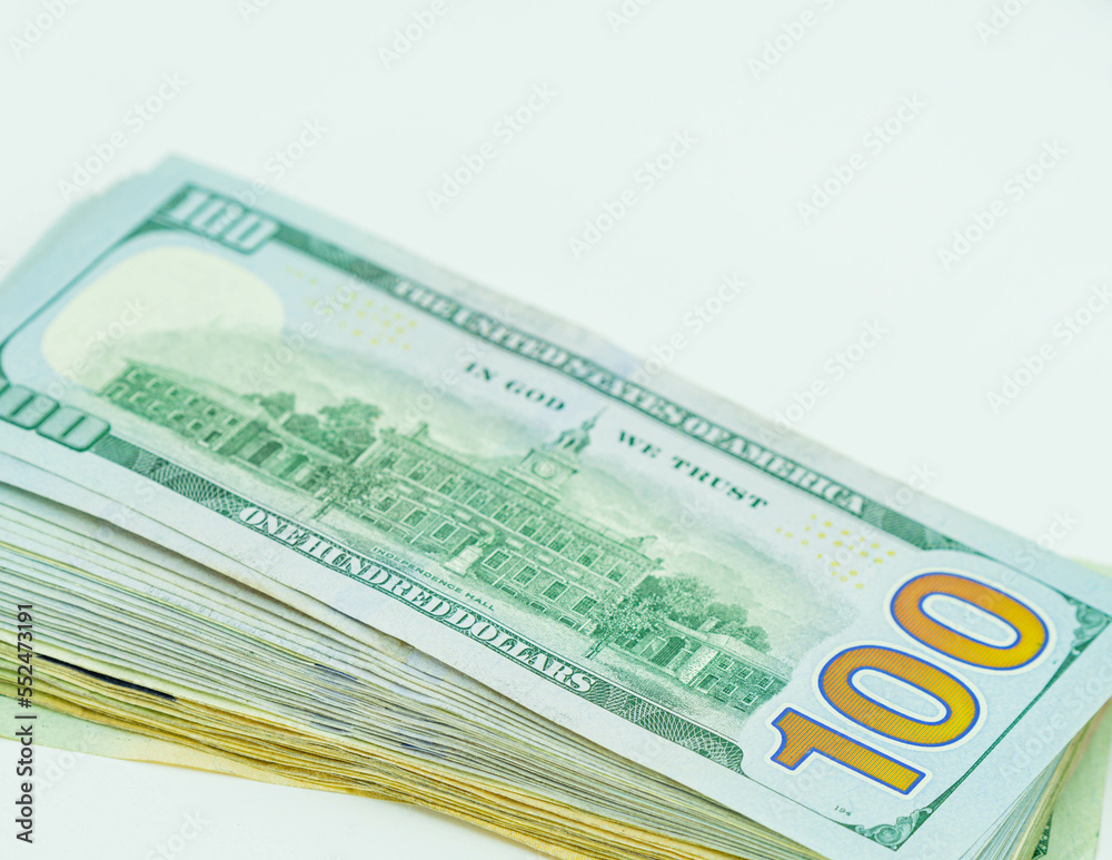 Stock of hundred dollar bills on white background. Stock of hundred dollar bills on white background.