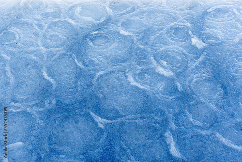 Colored ice. Abstract ice texture. Nature background. Sea ice. patterns on ice