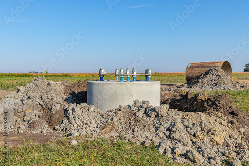 Electric utility power pole installation. Electrical grid infrastructure construction, repair and upgrade concept