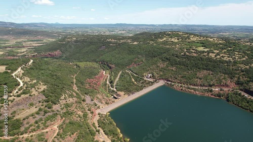 Big hydraulic dam Salagou lake aerial shot sunny day France photo