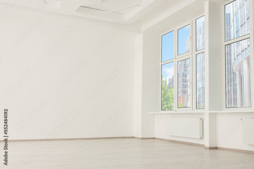 Modern office room with white walls and windows. Interior design Modern office room with white walls and windows. Interior design