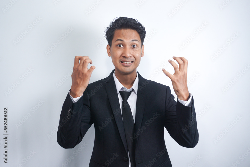 Angry man gesturing angrily raising hands and shouting loudly expressing anger after quarrel with boss or employee in suit isolated over white background. Feel my anger Angry man gesturing angrily raising hands and shouting loudly expressing anger after quarrel with boss or employee in suit isolated over white background. Feel my anger