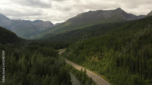 Aerial shot of a river and road in Alaska