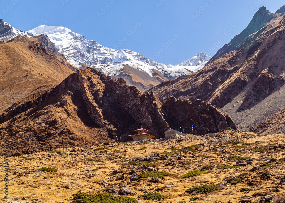 Temple with large himalayan mountains in the background, Annapurna Circuit, Nepal