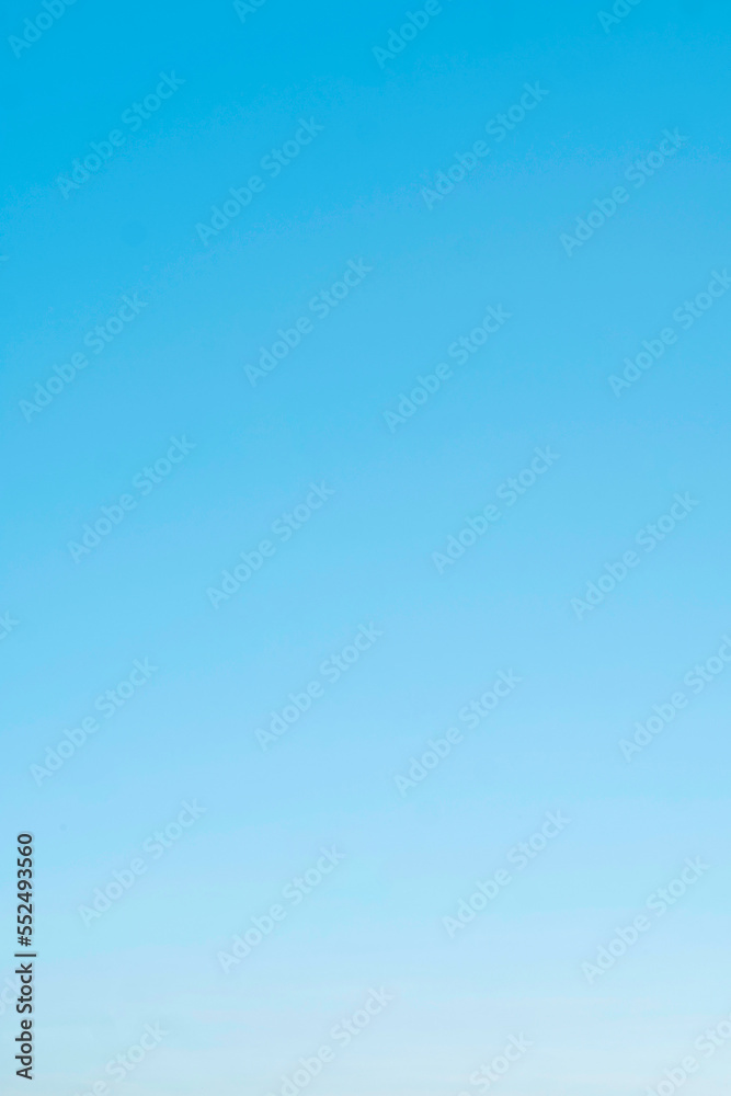 Blue Sky without cloud and clear abstract, Beautiful air sunlight with clear the sky scape colorful, used wallpaper background, vertical image