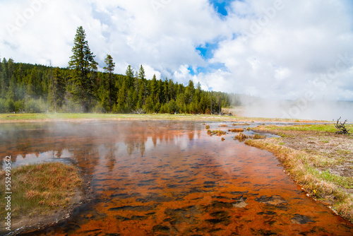 Surreal scene of Firehole Lake and steam in Yellowstone National Park