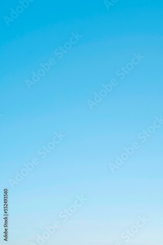 Blue Sky without cloud and clear abstract, Beautiful air sunlight with clear the sky scape colorful, used wallpaper background, vertical image