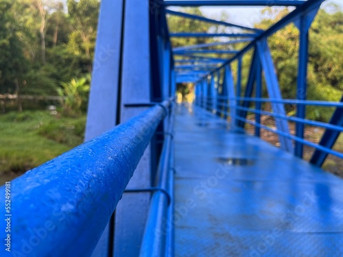 View at Lava Bantal located in Yogyakarta, Indonesia. There is bridge in blue color for crossing the river. © FaizZakiy
