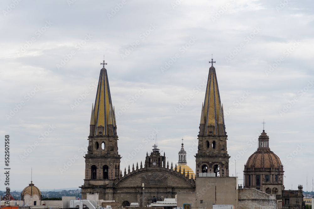Guadalajara Cathedral seen from the center, various roofs of houses mexico
