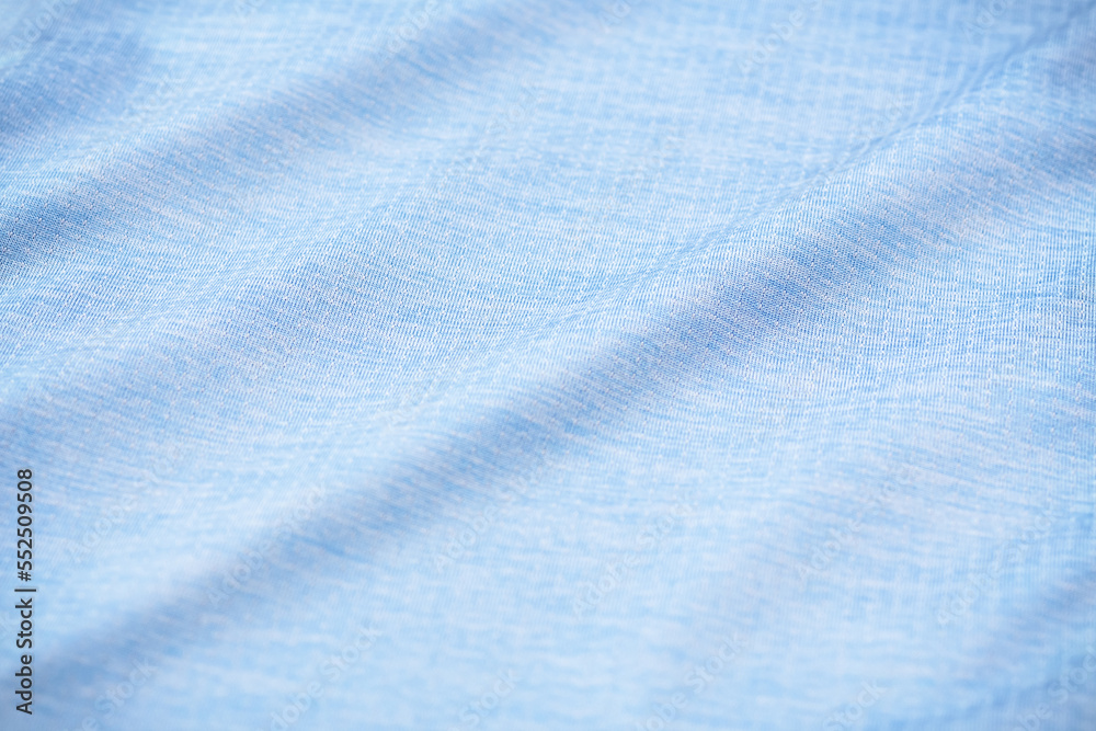 Fototapeta premium Blue sport fabric texture background, sportwear cloth