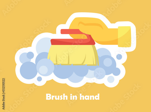Antibacterial brush sticker. Hand in yellow rubber glove with tool applies cleaning agent to surface. Character cleans apartment or room. Reaction for messengers. Cartoon flat vector illustration