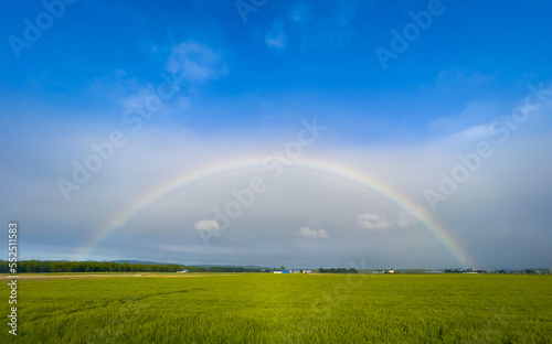 A huge rainbow that appeared on the plains