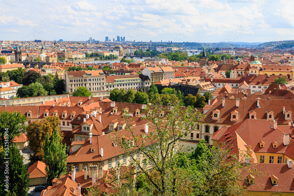 Obraz premium Roofs of houses and a view of the city of Prague. Background with selective focus and copy space