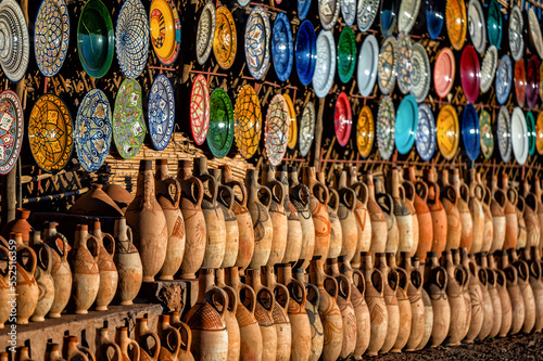 A set of traditional, handmade Moroccan clay dishes. Bowls, plates, tagines, jugs.