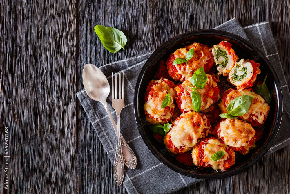 tasty chicken rollatini in tomato sauce, top view tasty chicken rollatini in tomato sauce, top view